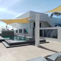 Cave Beach Resort - Boutique Accomodation, hotel em Dingalan