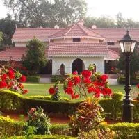 WelcomHeritage Golf View، فندق في باشمارهي