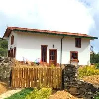 Cabaña Assyria, готель у місті Сапатока