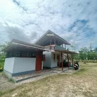 Panarean beach house, hotel i Caramay
