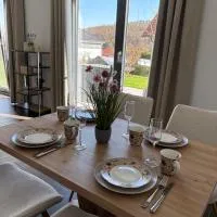 Gemütliche Ferienwohnung mit Sonnenterrasse, hotel in Schlitz