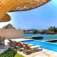 Departamento para 6 vista al mar con alberca y embarcadero、Conchalのホテル