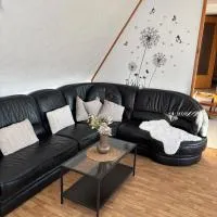 FeWo Lüttje Amselnüst - zentrale Lage mit Balkon, hotel en Dornum