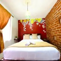 Hostal Green Garden, hotel in Baños