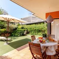 Pretty garden apartment next to a charming beach, h&ocirc;tel &agrave; Lloret de Mar