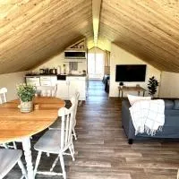 Loft du lac style scandinave, hotel en Alma