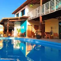 Villa Aconchego Guarajuba โรงแรมในกามาซารี