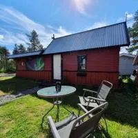 Camp Caroli Wooden Cabins, hôtel à Jukkasjärvi