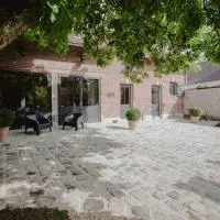 L'Atelier des Magnolias โรงแรมในAumont