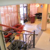 a view of a living room from the top of a staircase at Hotel Lobelia, Addis Ababa