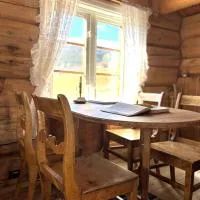 Stallen - koselig lite hus på gårdstun、Skjåkのホテル