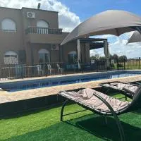 American-Style Family Villa with Private Pool & Playground Near Casablanca & El Jadida، فندق في Zaouia Sidi Bou Azza