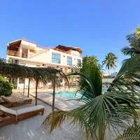 Mexhe Hotel El Cuyo, hótel í El Cuyo