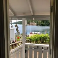 Viesnīca Barnevennlig med strand og hage - Wifi pilsētā Søgne