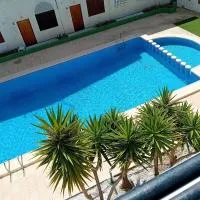 Studio with pool and sunrise view at 10 min beach walk، فندق في بويرتو دي مازارون