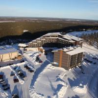 an aerial view of a hotel in the snow at Hotel Levi Panorama & Levi Chalets