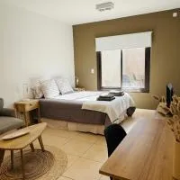 Champa Apart Pilar - Departamentos con kitchenette a pocos minutos del Parque industrial Pilar, H Austral y a mts de autopista panamericana、ピラルのホテル