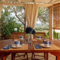 Blue Bay Home a pochi passi dalla baia di Porto Luna, hotel em Villasimius