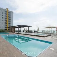 VAC - Condomínio beira mar na Praia de Itajubá, hotel di Itajubá