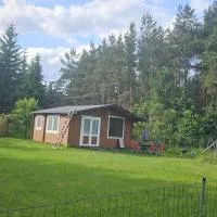 Zacisze 6 osobowy Domek nad jeziorem, hotel v destinaci Świętne