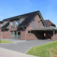 Luxus Ferienhaus Geest und Moor, hotell i Großheide