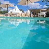 Pietre Vive Trulli del Salento, מלון בLatiano