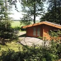 Houten huisje 7 voor Rust, Ruimte en Natuur, Hotel in Neede