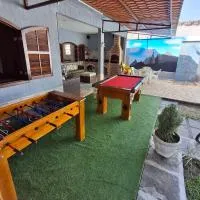 Casa no centro de Guapimirim, ar condicionado, piscina, churrasqueira, tranquilidade, hotel di Guapimirim