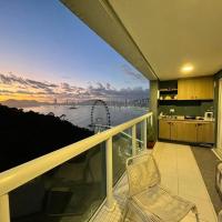 Vista mar e Roda Gigante com piscina, hotel en Balneario Cambori&uacute;