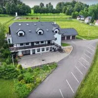 Turistická ubytovna Centrum Pastvinská přehrada se sdílenou koupelnou a toaletou, хотел в Nekoř
