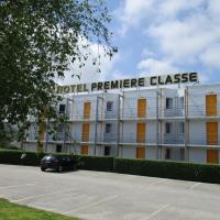 a building with a car parked in front of it at Première Classe Cherbourg - Tourlaville, Cherbourg en Cotentin