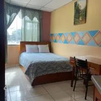 Hostal Abu Dhabi โรงแรมในกูเอ็งกา