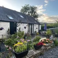 The Old Milking Parlour Flyingpiglets, hotel en Llandovery