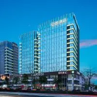 夏朗酒店 Xialang Hotel&Free ShuttleBus to Guangzhou BaiyunInternational Airpor, хотел в Гуанджоу