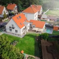 Mezidomí, hotell sihtkohas Budyně nad Ohří