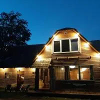 Holiday house Bajāru pirtiņa, hotel a Rucava