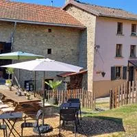 Mini camping La Maison Rose، فندق في Bertignat