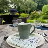 "Un matin au jardin", hotel i Francorchamps
