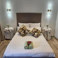 On Point Tranquil Garden Constantiaberg، فندق في Sweet Valley