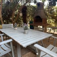 Appartamento fronte mare con veranda Orata, hotel a l'Alguer