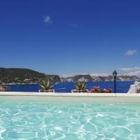 a swimming pool with a view of the ocean at Hotel Torre Dei Borboni, Ponza