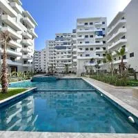 Duplex Luxe 3 Chambres Vue Mer & Piscine à Zenata Eco City, Hotel in Aïn Harrouda