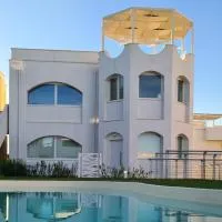 White Oasis - Piscina e Ombrellone in spiaggia seconda fila incluso, hotel v destinácii Marcelli