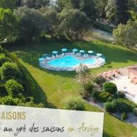 Camping les 4 saisons، فندق في Oust
