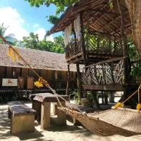 Amami Beachfront Bungalows & Villa, hotel di Puerto Galera