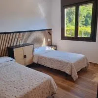 Albergue CAROI HOSTEL & ROOMS Armenteira, hotel v destinácii Santa María