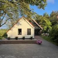 De Geluksbrenger โรงแรมในSpanga