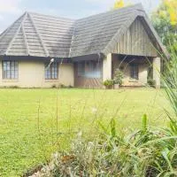 Toshi's Lodge, hotel din Hopewell