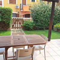 Casa di Lu' - Bilocale con giardino - Porto Pollo, hotel a Porto Pollo