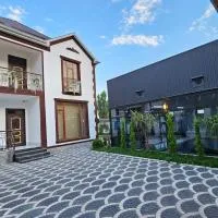 Gabala Milan Villa, indoor heated pool and jacuzzi with garden view، فندق في غابالا